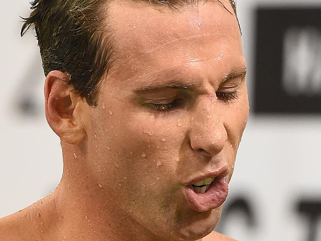 Grant Hackett reacts after swimming in the Mens 200m Freestyle Semi-Final on day 2 of the Australian Swimming Championships at the SA Aquatic and Leisure Centre in Adelaide, Friday, April 8, 2016. (AAP Image/Dave Hunt) NO ARCHIVING, EDITORIAL USE ONLY