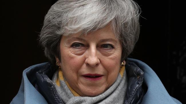 Theresa May outside Downing Street ahead of her disastrous Brexit defeat in the House of Commons yesterday. Picture: Getty Images 