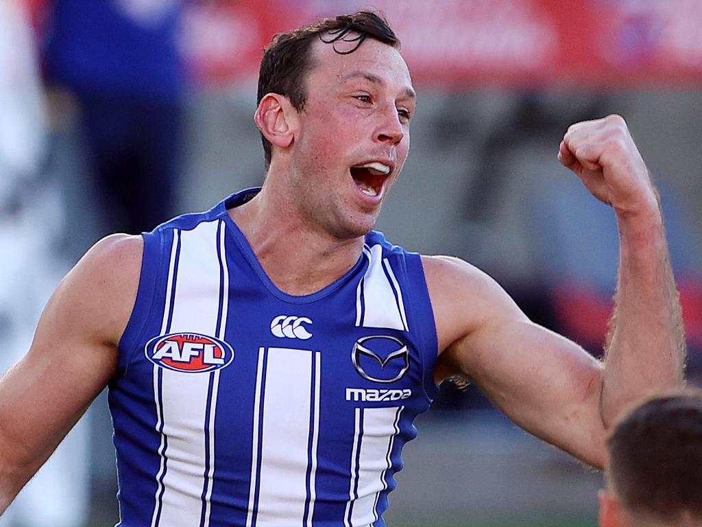 AFL Round 9. North Melbourne vs Adelaide at Metricon Stadium, Gold Coast.  01/08/2020.   Todd Goldstein of the Kangaroos celebrates an early North Melbourne goal   . Pic: Michael Klein