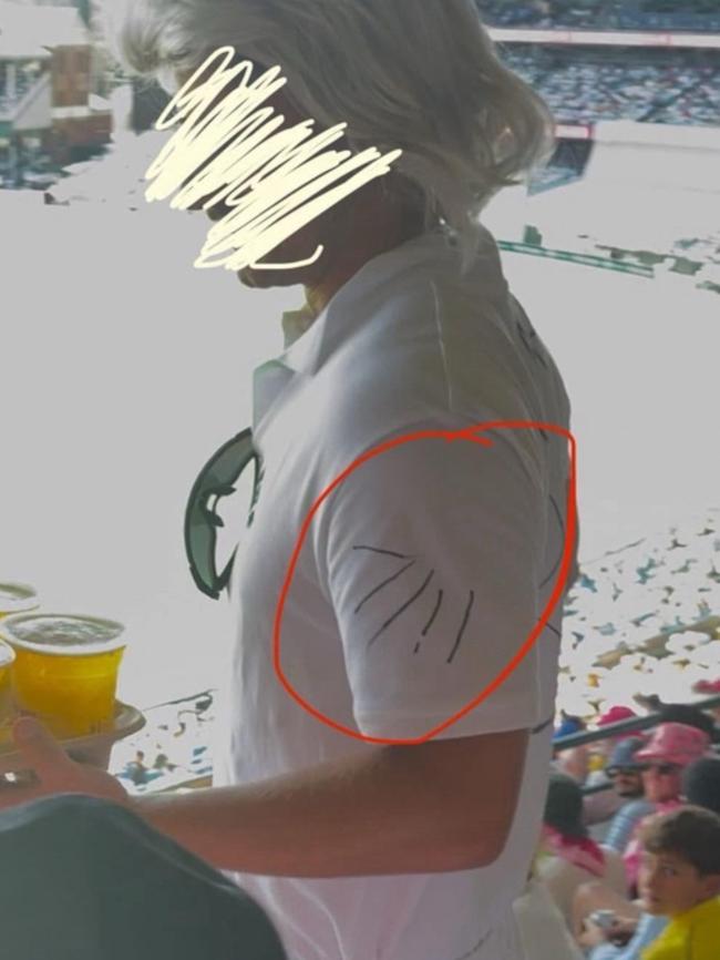 The term ‘7/11’ written on an Australian fan’s shirt at the SCG.