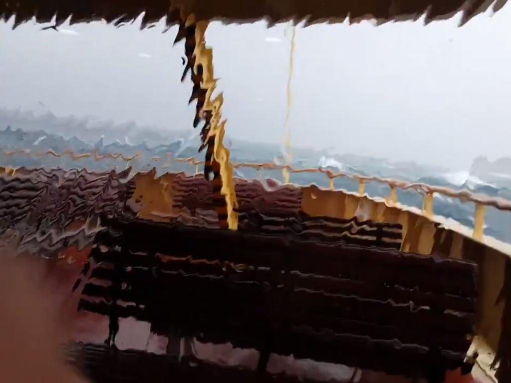 A huge wave crashes into the Manly ferry.