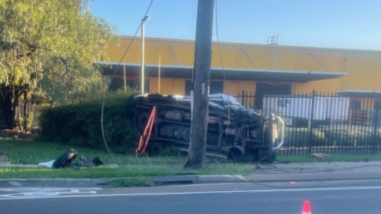 Driver rescued after power lines fall on car after crash at Seven