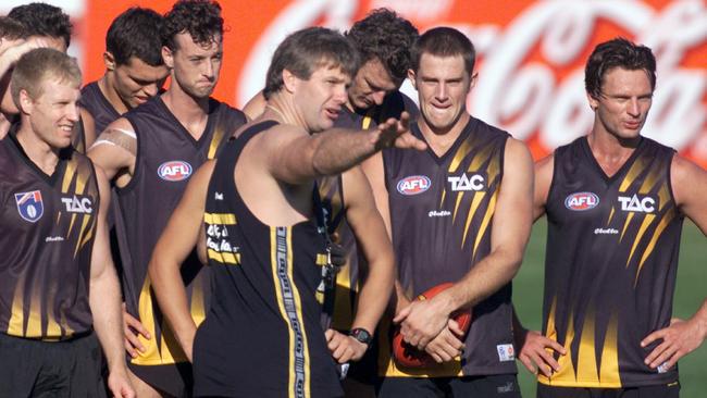 Danny Frawley chats to his players while in charge at Richmond.