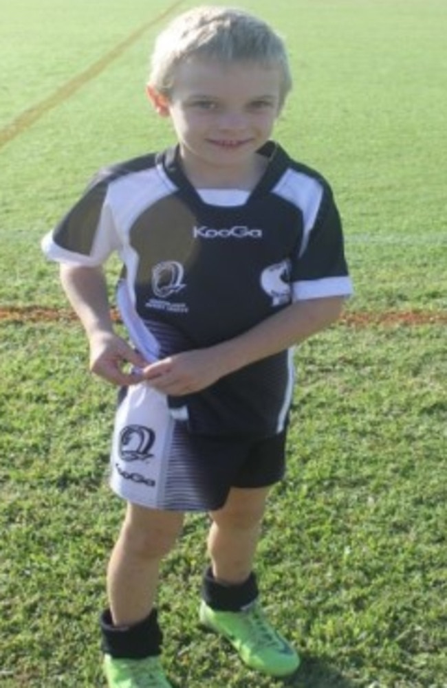 Harrison Hill scored a try in his first game of rugby league with the Mackay Magpies under-6 team.