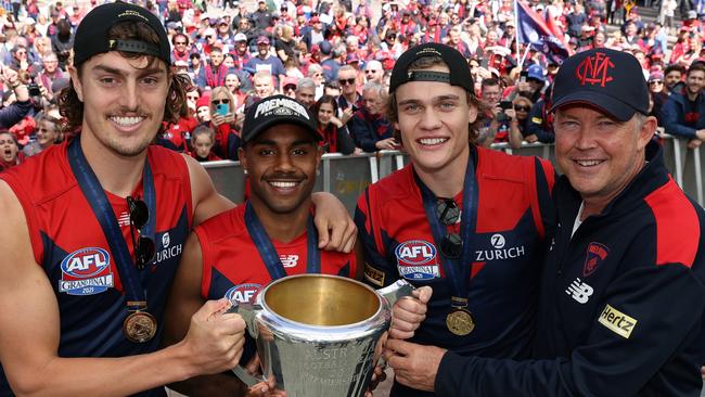 Luke Jackson, Kozzy Pickett, Trent Rivers and Melbourne chief executive Gary Pert with last year’s premiership cup in Perth. Picture: Paul Kane