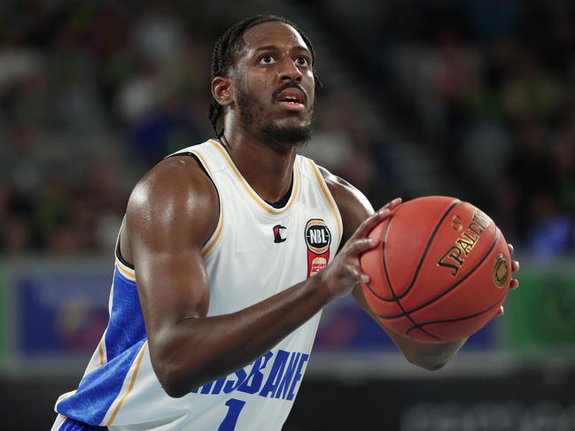 MELBOURNE, AUSTRALIA - OCTOBER 12: Keandre Cook of the Bullets shoots a free throw during the round four NBL match between South East Melbourne Phoenix and Brisbane Bullets at John Cain Arena, on October 12, 2024, in Melbourne, Australia. (Photo by Daniel Pockett/Getty Images)