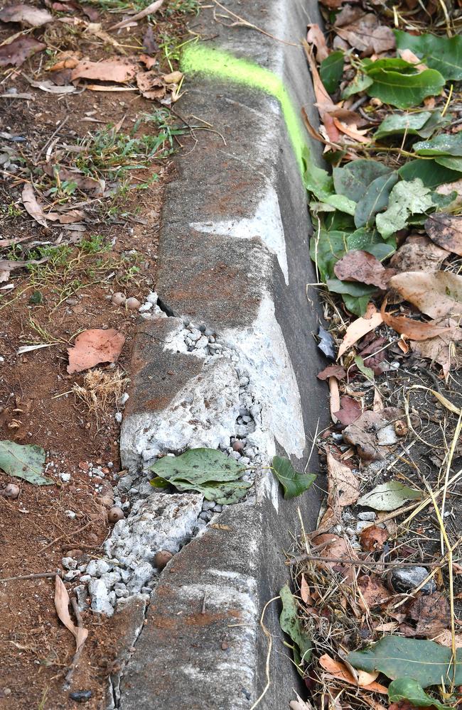 Damage to a kerb at the site of a Brendale crash that has left five teenagers hospitalised last night. Picture: John Gass