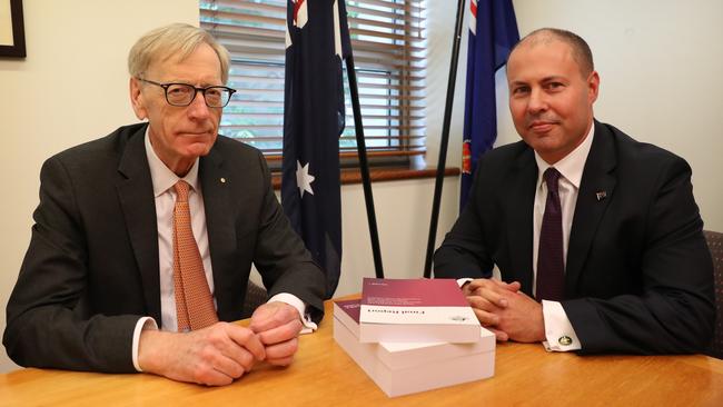 Commissioner Kenneth Hayne and Treasurer Josh Frydenberg with the final report from the Royal Commission into Misconduct in the Banking, Superannuation and Financial Services Industry. Picture: Kym Smith/News Corp Australia