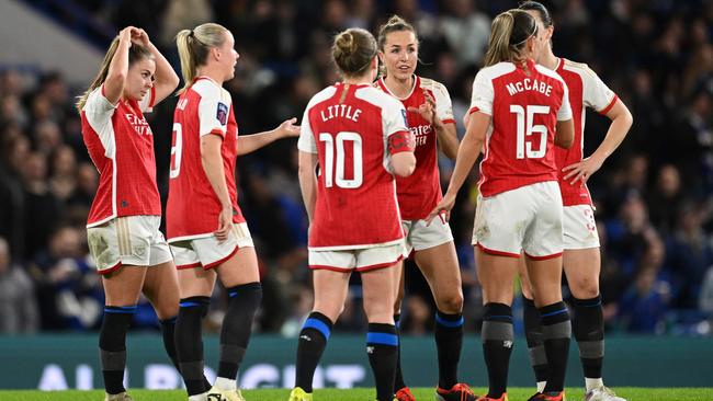 Arsenal players wear Chelsea socks with tape over the rival sponsor. (Photo by Justin Setterfield/Getty Images)