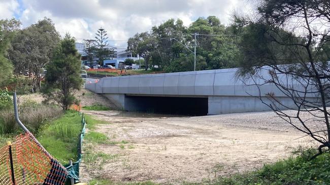 Construction of a new bridge over tiny Flat Rock Creek at Currumbin on the Southern Glitter Strip.