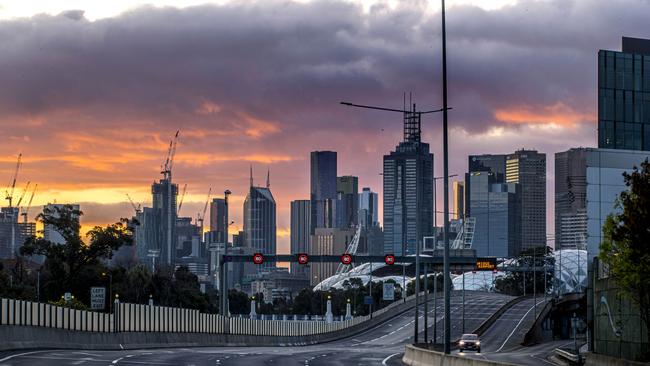 A lone car leaves the Melbourne CBD on the Monash Freeway on Sunday evening just before curfew during stage 4 lockdown. Picture: NCA NewsWire/David Geraghty