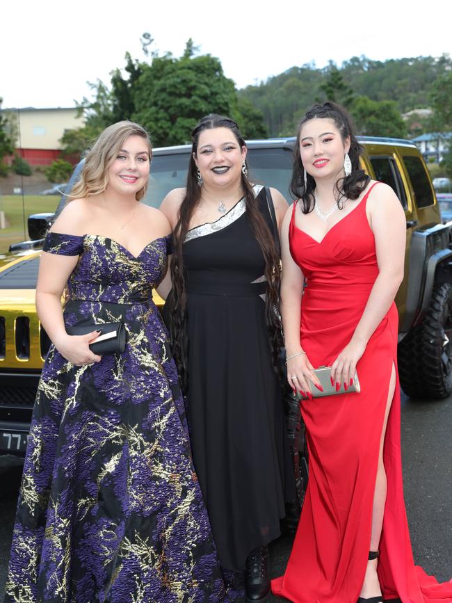 Pacific Pines High formal, at the school. Jordan Hall, Savanna Karati & Alexia Wu Picture Glenn Hampson