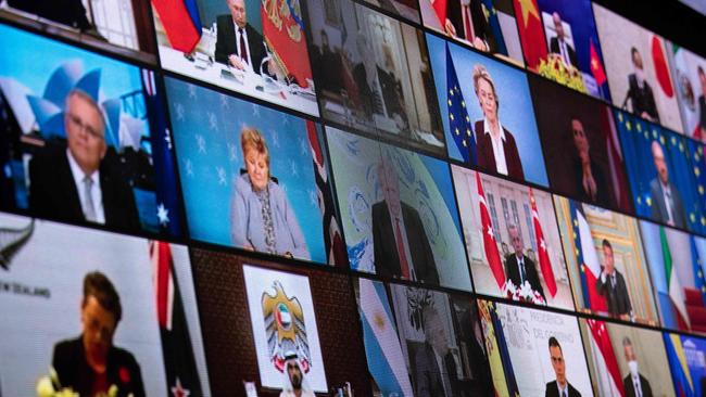 Scott Morrison, upper left, with the Sydney Opera House as his backdrop, takes part in the climate change virtual summit hosted by US President Joe Biden. Picture: AFP