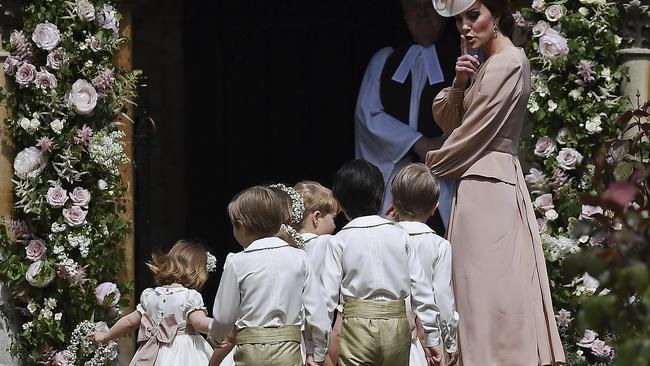 The Duchess of Cambridge marshalling the children ahead of the ceremony. (Justin Tallis/Pool Photo via AP)