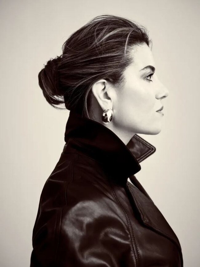 Lewinsky wore bold earrings with her statement trench. Picture: Reformation