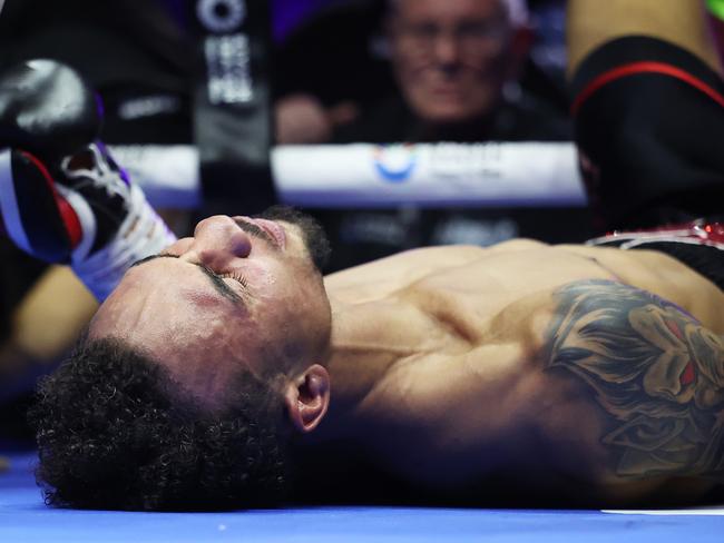 RIYADH, SAUDI ARABIA - OCTOBER 12: Ben Whittaker reacts after falling out of the ring with Liam Cameron during a clinch during the Light Heavyweight fight between Ben Whittaker and Liam Cameron as part of the Riyadh Season - IV Crown Showdown card at Kingdom Arena on October 12, 2024 in Riyadh. (Photo by Richard Pelham/Getty Images)