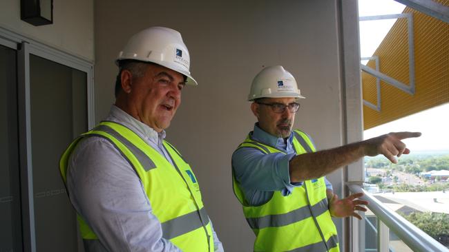 Property developer Carlo Randazzo, right,  and Minister for Housing and Community Development Gerry McCarthy on site at the Palmerston Circuit multi-storey development