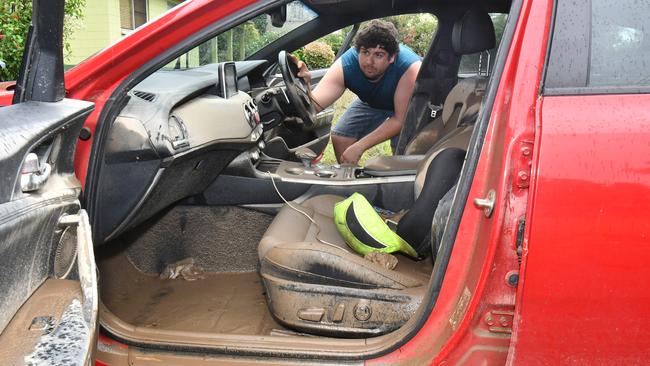 Tuesday February 4. Heavy rain causes flooding in North Queensland. Giru resident Zac Herlihy lost his car in Mill street to floodwater. Picture: Evan Morgan