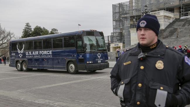 An Air Force bus waits to pick up a congressional delegation for the cancelled military flight. Picture: AP