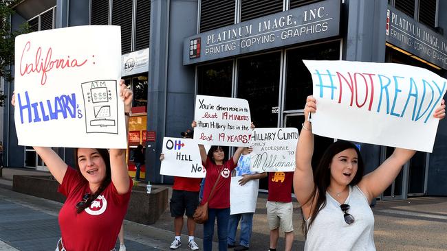 Californian College Republicans protesting against Hillary Clinton's fundraising visit outside the Democratic Party offices in California, where Clinton regularly met with deep-pocketed supporters to amass funds needed to win the White House. Picture: AFP / Mark Ralston