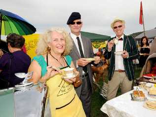 TOP NOTCH: Rosie Lee, RJ Poole of Lismore, and Ted Hoddinott of Bentley having a high tea at the Bentley CSG site with two Bentley cars on Saturday. Picture: Doug Eaton