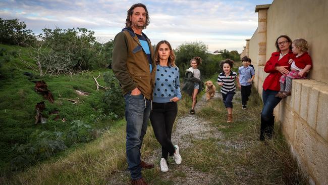 Niek van Santen, wife Marcelly and Talia, 11, with Helena Everkans-Smith, Evelince, 1, and 7-year-olds Axel, Toki and Daniel. Picture: Colin Murty.