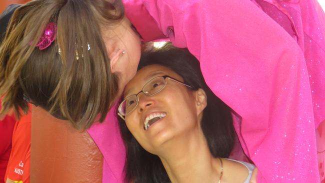 Sharing a delightful moment together at the Mareeba Multicultural Festival, mother and daughter Tiffany and 12-year-old Zoe Turnour, of Cairns. Picture: David Anthony.