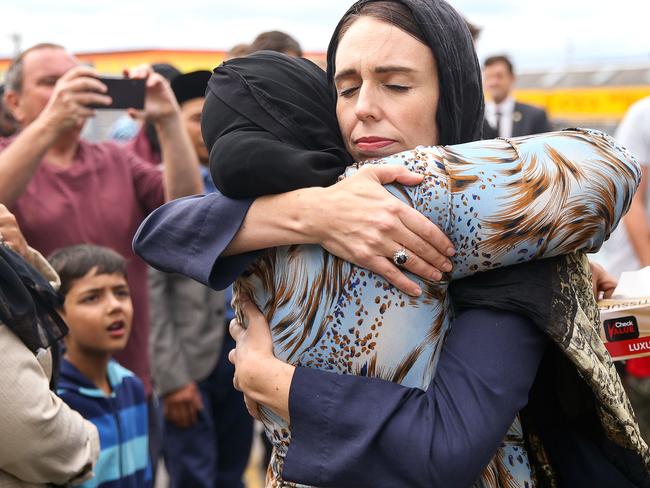 New Zealand Prime Minister Jacinda Ardern hugs a worshipper at the Kilbirnie Mosque in Wellington, in the aftermath of the devastating 2019 terrorist attack in Christchurch. Picture: Hagen Hopkins/Getty Images