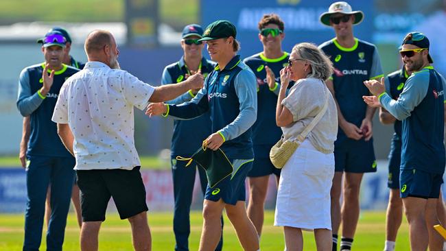 Cooper Connolly after being presented with his baggy green. (Photo by Ishara S. KODIKARA / AFP)