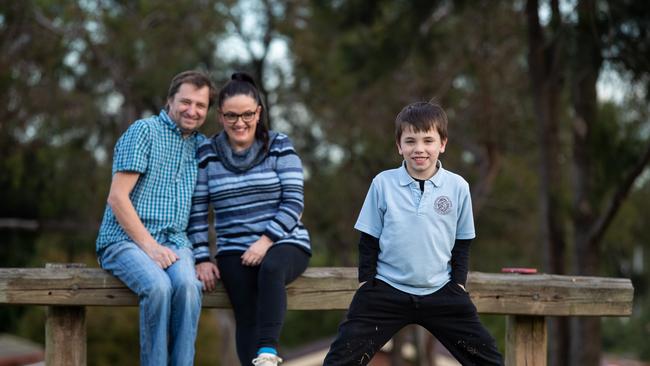 Rob and Samantha Skrzypek with their son Braxton, 7, who has a sleep disorder that results in him falling asleep anywhere. They have been waiting 18 months for a diagnosis. Picture:Justin Lloyd