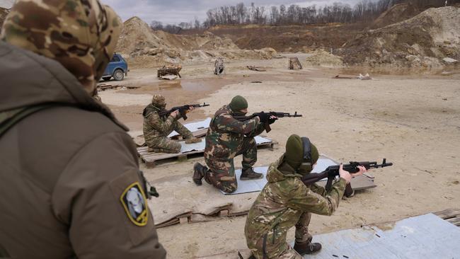 Ukrainians shoot at targets during a combat training day hosted by a local paramilitary civil formation called TSEL. Picture: Getty Images.