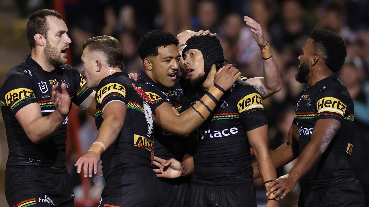 PENRITH, AUSTRALIA - SEPTEMBER 13: Jarome Luai of the Panthers celebrates scoring a try with Paul Alamoti of the Panthers during the NRL Qualifying Final match between Penrith Panthers and Sydney Roosters at BlueBet Stadium on September 13, 2024 in Penrith, Australia. (Photo by Cameron Spencer/Getty Images)