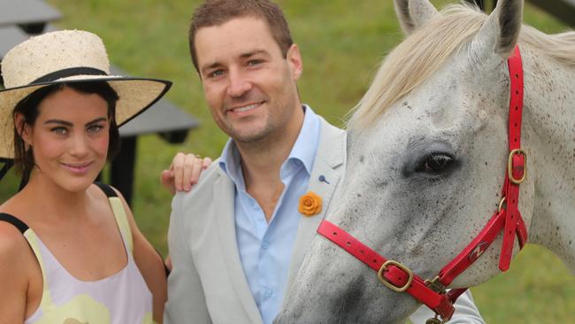 Looking forward to the Aquis $1.5 Million Raceday Clare and Dan Anstey, dressed in French Riviera themed raceday attire, with Shrek the horse at the Gold coast Turf Club. Picture Glenn Hampson