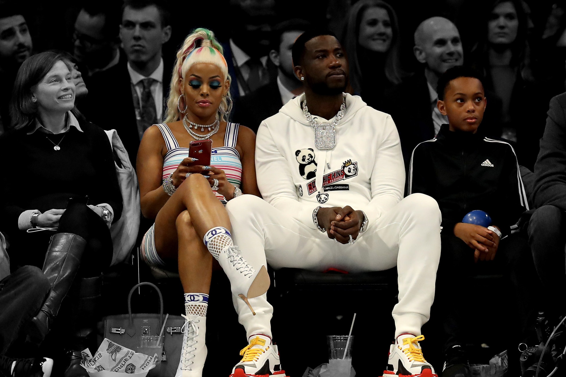 Celebrities sitting courtside at the NBA All-Star Game