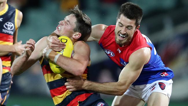 Alex Neal-Bullen was in the thick of it against Adelaide – here he caught Crow Chayce Jones high. Picture: Sarah Reed