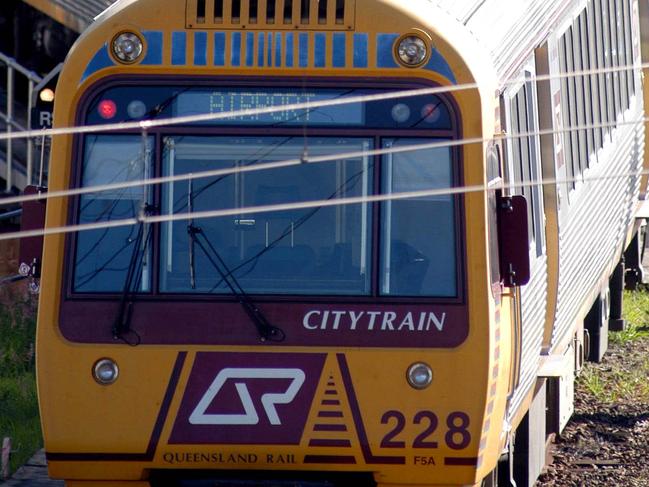 Generic of public transport Re: Budget - train at Roma Street Station .