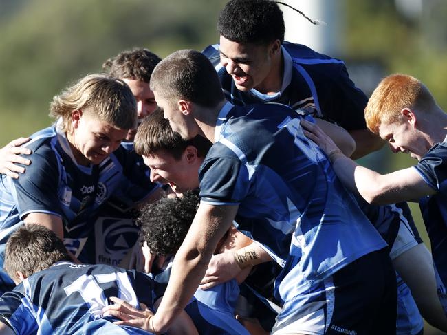 Illawarra SHS celebrate the win at fulltime during the NRL Schoolboy Cup match between Illawarra SHS and Erindale College at the Collegians Sports & Performance Centre in Figtree. Picture: Jonathan Ng