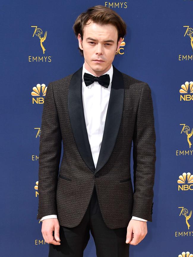 Suited up! Charlie Heaton. Picture: AFP