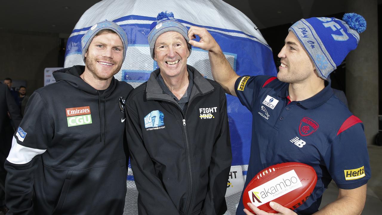 The BIG FREEZE is on again - the return of the 'ice age' at the MCG with the FightMND Army poised to march again on Queens Birthday. Please join the team at FightMND to launch BIG FREEZE 7, officially unveil the iconic beanie &amp; kick off the 2021 campaign to 'beat the beast'. Neale Daniher launches the Big Freeze 7 with CollingwoodÃ&#149;s Taylor Adams and MelbourneÃ&#149;s Jack Viney helps with NealeÃ&#149;s beanie beside a giant sized beanie at the MCG. Picture: David Caird