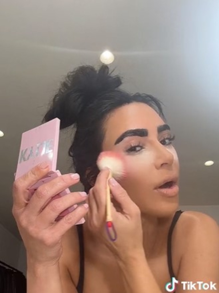 Kim whipped out a Kylie compact for her OTT look.