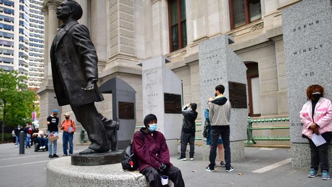 Voters queue outside of Philadelphia City Hall to cast their ballots at the satellite polling station in Philadelphia, Pennsylvania. Picture: AFP