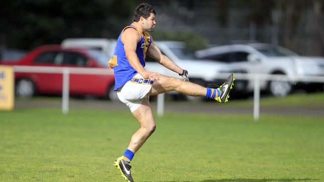 Marc Holt kicks his 100th goal in 2013.