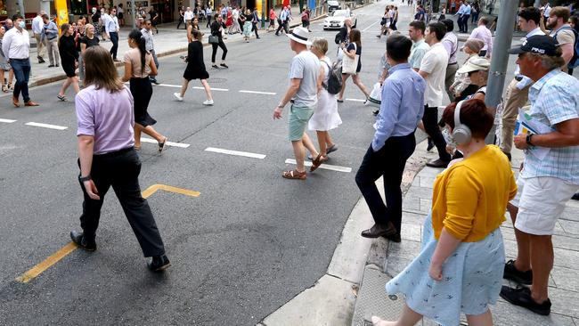 General pictures of crowds and office workers returning to the Brisbane CBD Brisbane Monday 14th March 2022 Picture David Clark