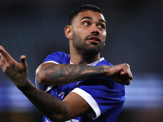 MELBOURNE, AUSTRALIA – AUGUST 12: Tarryn Thomas of the Kangaroos warms up before the round 22 AFL match between North Melbourne Kangaroos and Essendon Bombers at Marvel Stadium, on August 12, 2023, in Melbourne, Australia. (Photo by Darrian Traynor/Getty Images)