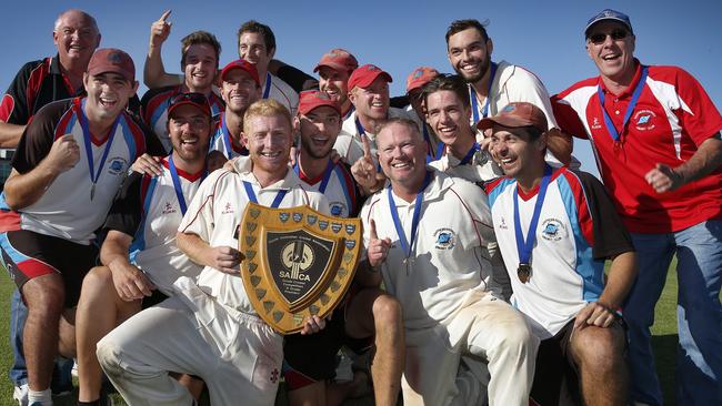 Southern District players and officials celebrate after the club won its first A-grade premiership – 23 years after entering the competition. Picture Dean Martin.