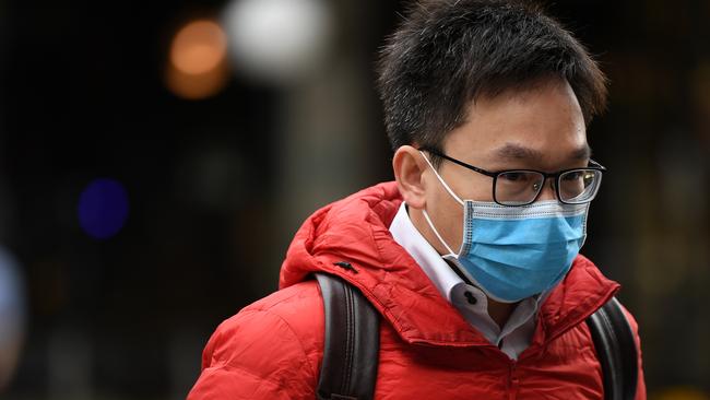 A man wearing a face mask as a preventative measure against coronavirus COVID-19 in Sydney. Picture: AAP Image/Joel Carrett