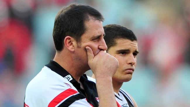 Lyon and Leigh Montagna after the 2009 Grand Final loss to Geelong. Picture: News Corp Australia