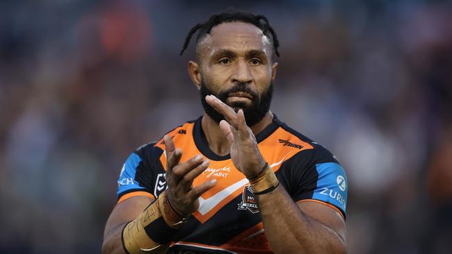SYDNEY, AUSTRALIA - JUNE 15: Justin Olam of the Wests Tigers celebrate victory following the round 15 NRL match between Wests Tigers and Gold Coast Titans at Leichhardt Oval on June 15, 2024 in Sydney, Australia. (Photo by Jason McCawley/Getty Images)
