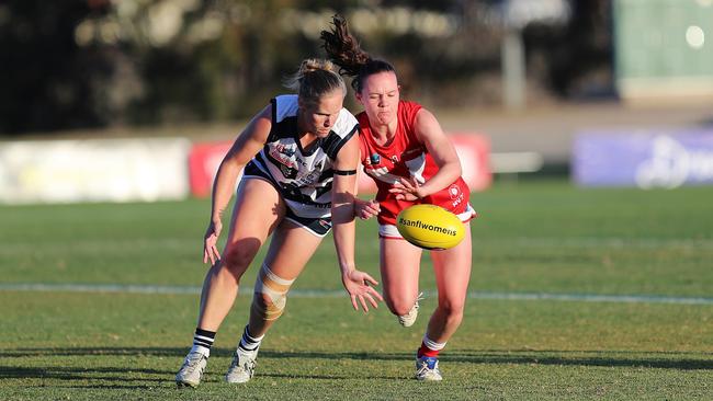 North Adelaide's Julia Clark battles South Adelaide's Lauren Buchanan during the 2020 round four SANFLW clash. Picture: Deb Curtis