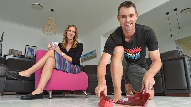 Simone Channells looks on as husband Geoff does house work at their family home at Terrigal. (AAP IMAGE / Troy Snook)